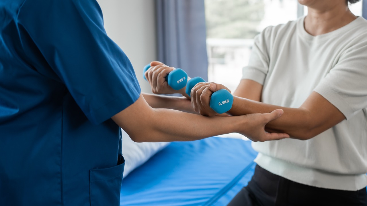 Asian senior care nurses and grandmothers provide caring support to elderly women